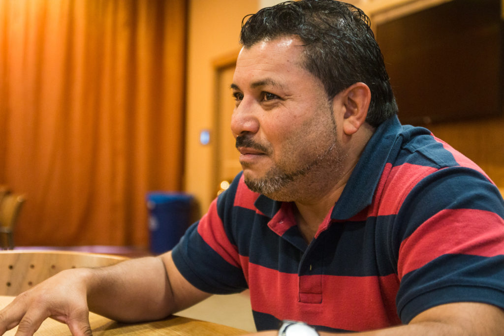 Mario Osorio, Proyecto Carrito Caravan co-director and Emerson maintenance worker, speaks at the University of Denver.