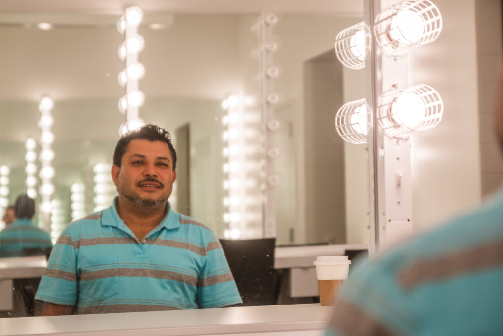 Proyecto Carrito Caravan co-director Mario Ernesto Osorio prepares in the Emerson Los Angeles dressing room.